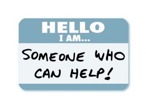 Picture of a name badge that says "Hello I Am Someone Who Can Help!"