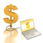 photo of a gold dollar sign and a laptop computer