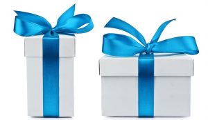 White gift boxes tied with blue satin bows.